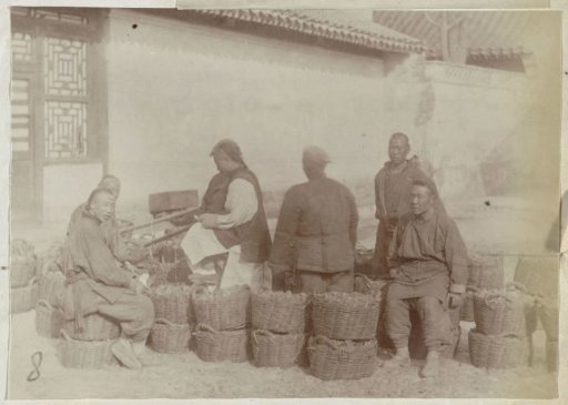 People with Baskets Taking a Break During Work, China