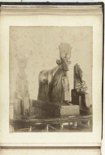 Egyptian statues of Isis, Osiris, and Hathor