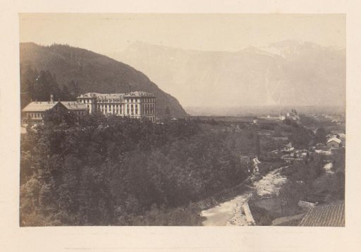 View of a Valley in the Alps, Possibly a Hotel on the Left