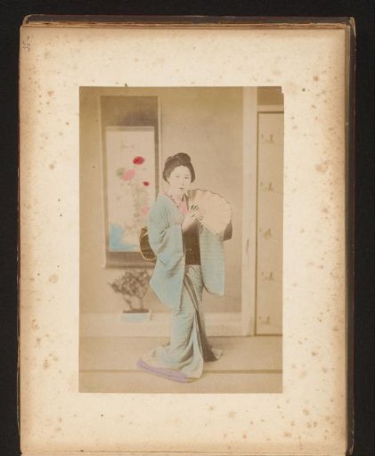 Portrait of a Japanese woman with a fan
