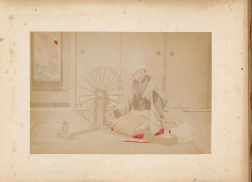 Japanese woman processing raw silk into thread