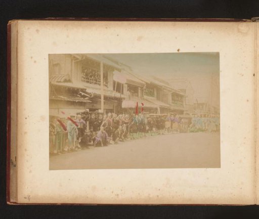 Crowd along a road at a parade in Japan