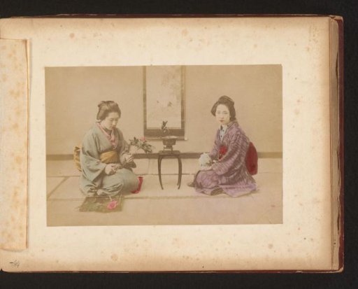 Two Japanese women with flowers