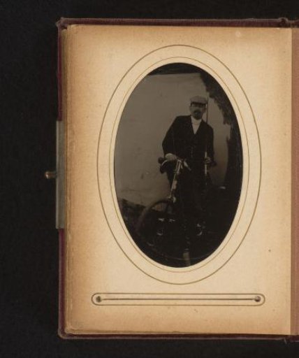 Portrait of a man with a cap and bicycle