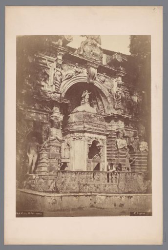 Two men leaning over the balustrade in the Villa d'Este at Tivoli, Italy