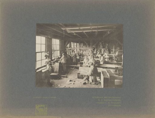 Group of workers in the furniture factory N.V. Meubelfabriek