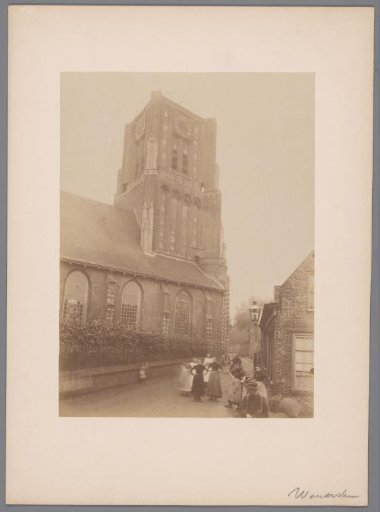 Tower of the Saint Martin's Church in Woudrichem, with onlookers
