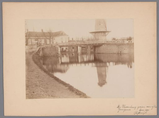 View of the Hoorn Bridge and a mill, seen from the towpath in Rijswijk
