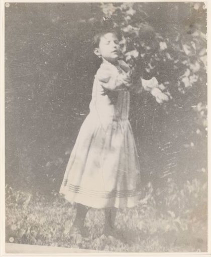 Portrait of a Girl Playing with a Ball