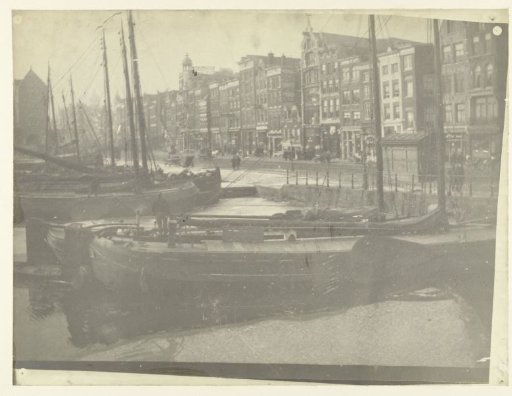 Ships on Damrak in Amsterdam