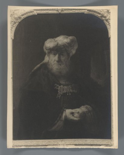 Photographic reproduction of a painted portrait of a man in Oriental dress by Rembrandt van Rijn