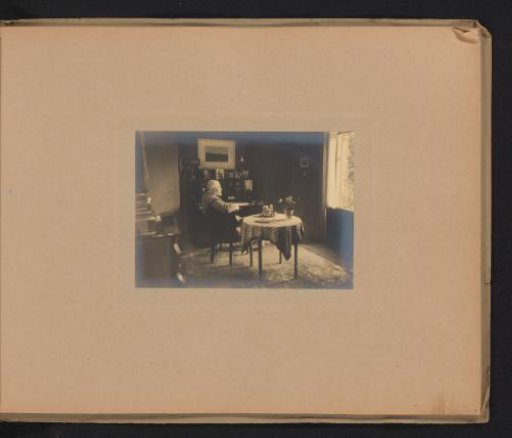 Lucas Jonker seated at his desk at Bussum