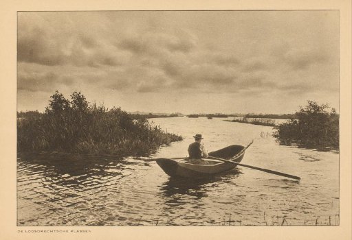 Man in a rowing boat on the Loosdrechtse Plassen