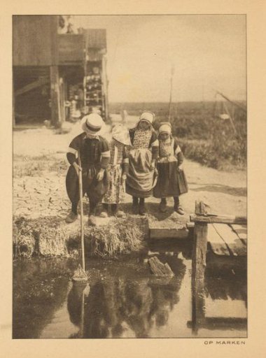 Children on a quay in Marken