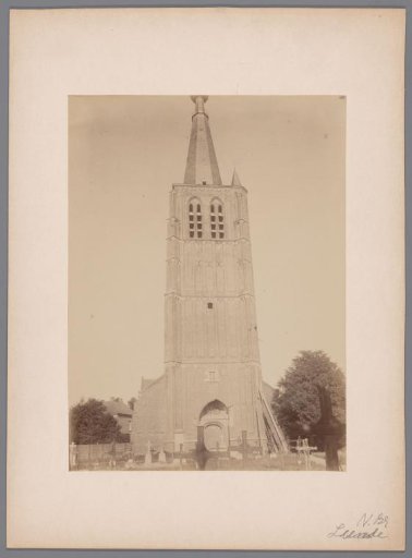 View of the tower and the cemetery of the Church of Saint Peter in Chains in Leende
