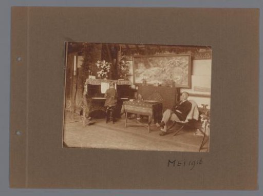 Girl at a Piano, Man Sitting in a Chair in an Interior, ca. 1916