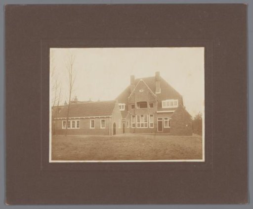 View of a Detached House with Garden