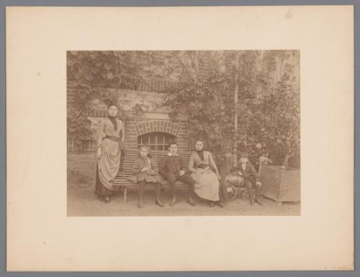 Group portrait of children/family in garden