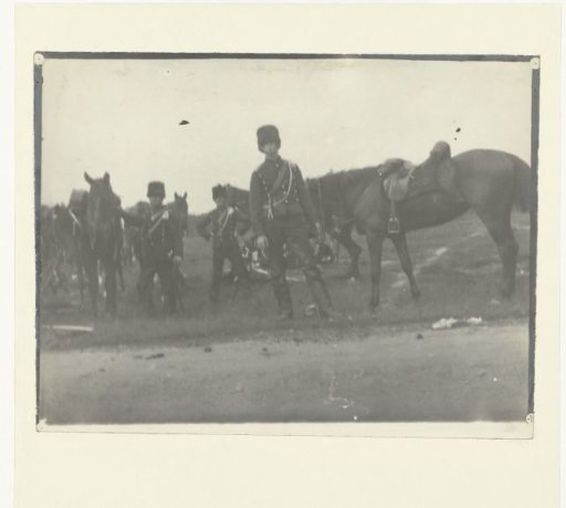 Cavalry in resting position on a field