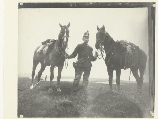 Portrait of a mounted artilleryman with two horses