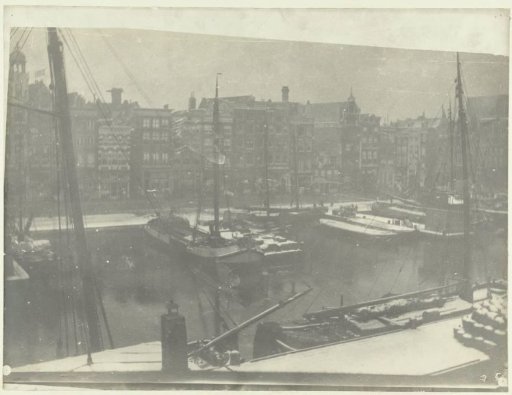 Ships at the Damrak in Amsterdam