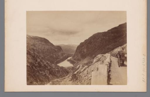 View from Reldalsfjeldet down towards the farmsteads and the fjord, Norway