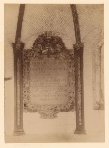 Bricked-up stone with wooden frame in the Van Haren Church in Sint-Annaparochie