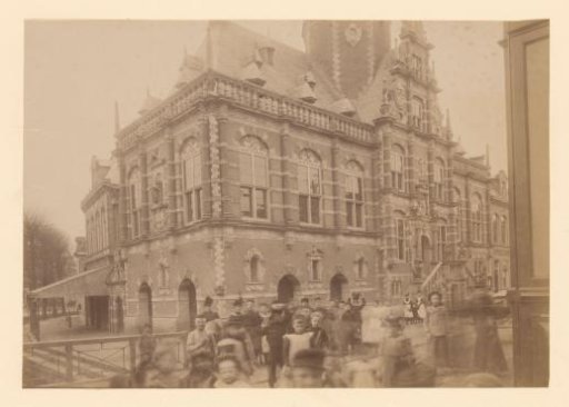 Town Hall in Bolsward, with a large number of children in the foreground