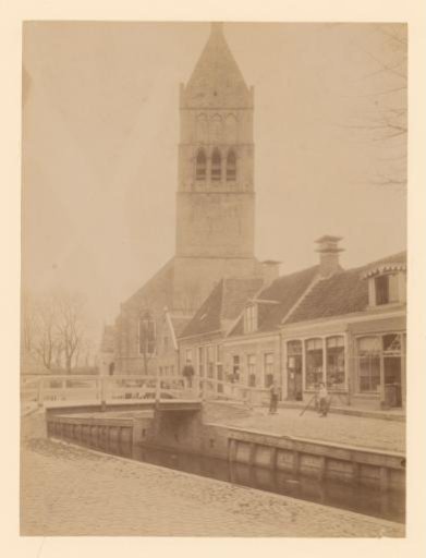 Street View with the Tower of the Martinikerk in Bolsward