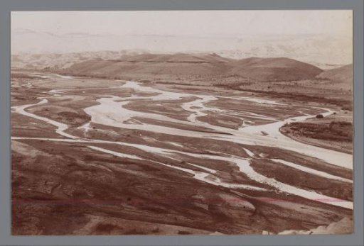 Landscape with river, floodplains and hills in the background, Iran