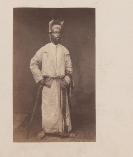 Portrait of a standing man with an umbrella