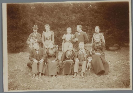 Group portrait of a company in the garden