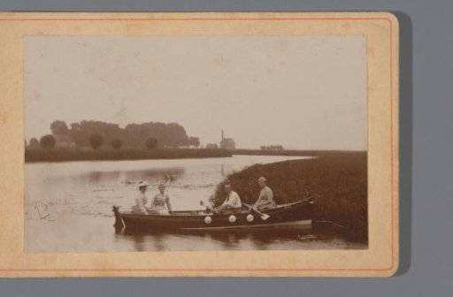 Group portrait of a company in a rowing boat