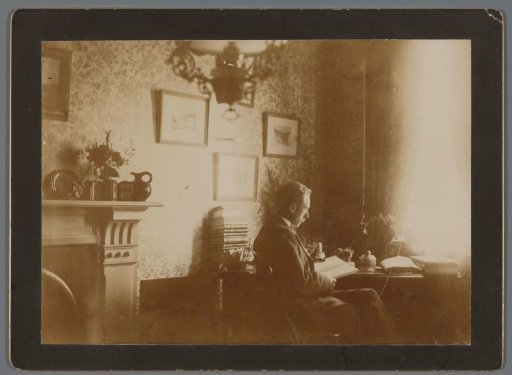 Portrait of Willem Jacobus Jonker reading by the window
