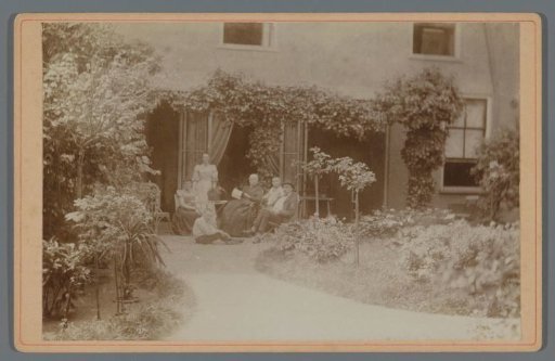 Group portrait of a company in the garden