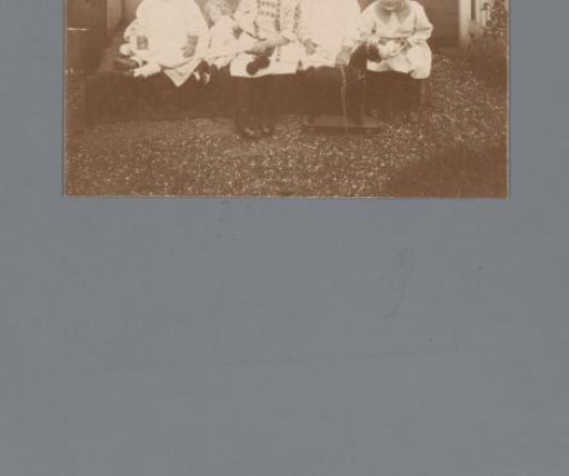 Group Portrait of Four Children with Toys