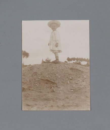 Portrait of a child on a sand dune