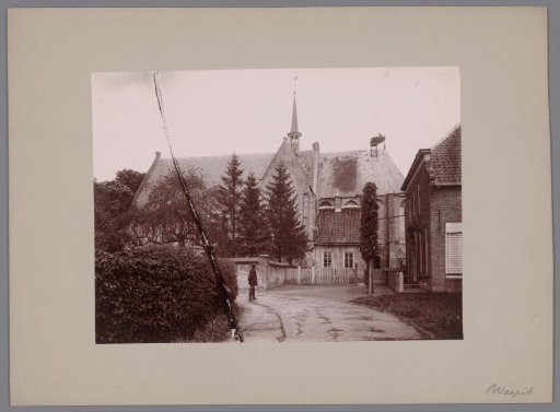 View of the Reformed Church in Waspik with a stork on the roof