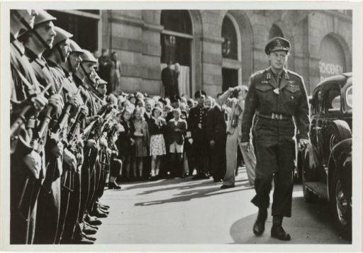 Bernhard of Lippe-Biesterfeld inspects the Dutch Internal Forces on the Dam in Amsterdam on his birthday on 29 June 1945