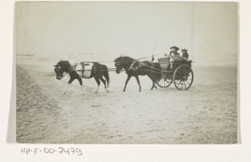 Wilhelmina, Queen of the Netherlands, and Juliana, Queen of the Netherlands, in a carriage on the beach