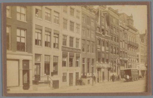 View of a row of houses on the Rokin between the Taksteeg and the Watersteeg in Amsterdam
