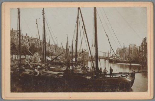 View of packet boats at the Damrak in Amsterdam