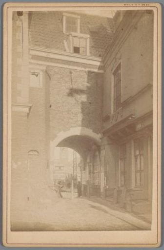 View of the Beurspoortje in Amsterdam with a view through to the Dam