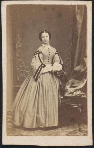 Portrait of a Young Woman in a Long Dress