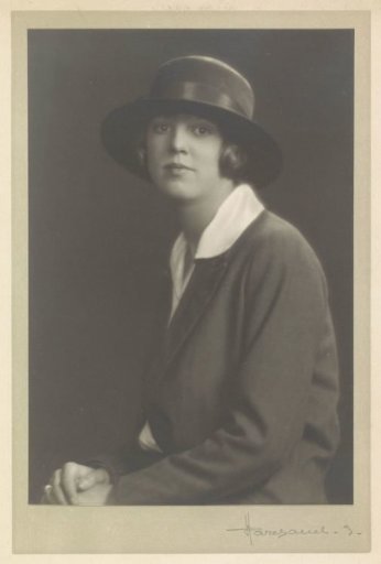 Portrait of G.A. Urtebise seated in an equestrian costume with a bowler hat
