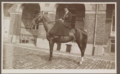 G.A. Urtebise in an equestrian costume sitting on a horse