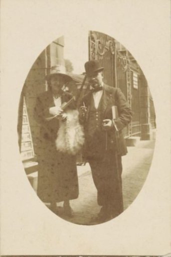 Portrait of a couple at a gate