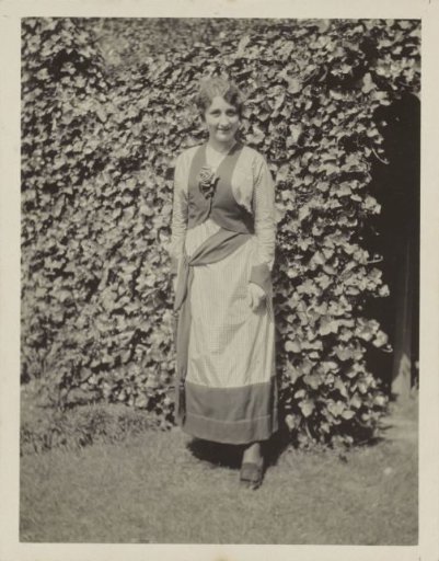 Portrait of a woman in a checkered dress at Wimbledon