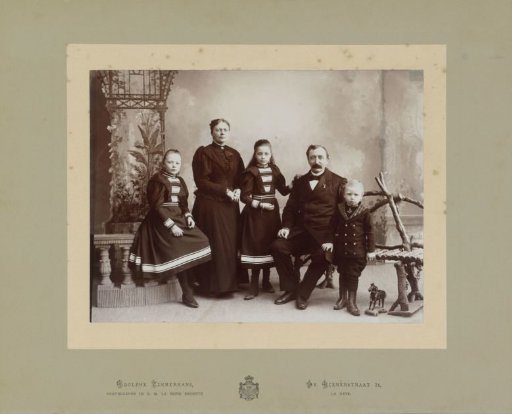 Portrait of parents with their children