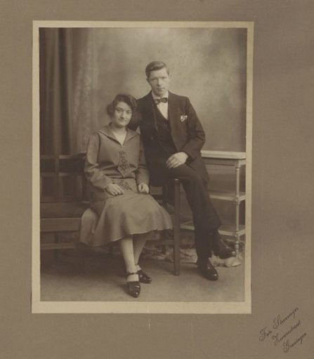 Portrait of a man and a woman on a bench